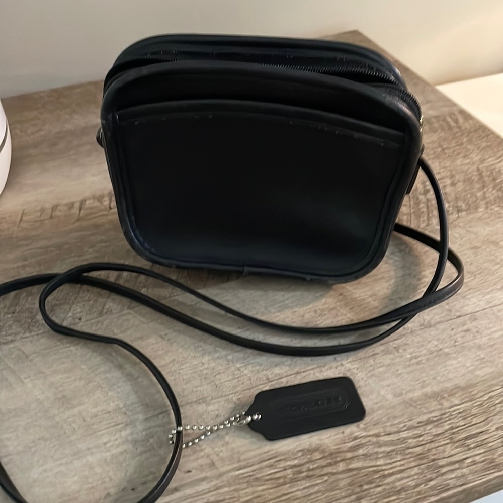 Small black leather Coach purse